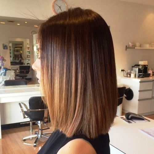 Dark Collarbone Haircut with Highlights