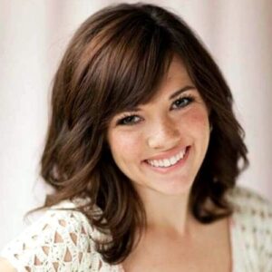 Trendy Mid Length Haircut With Side Fringe